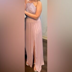 Size 10 women’s ￼David‘s bridal long dress the color is Iris ￼